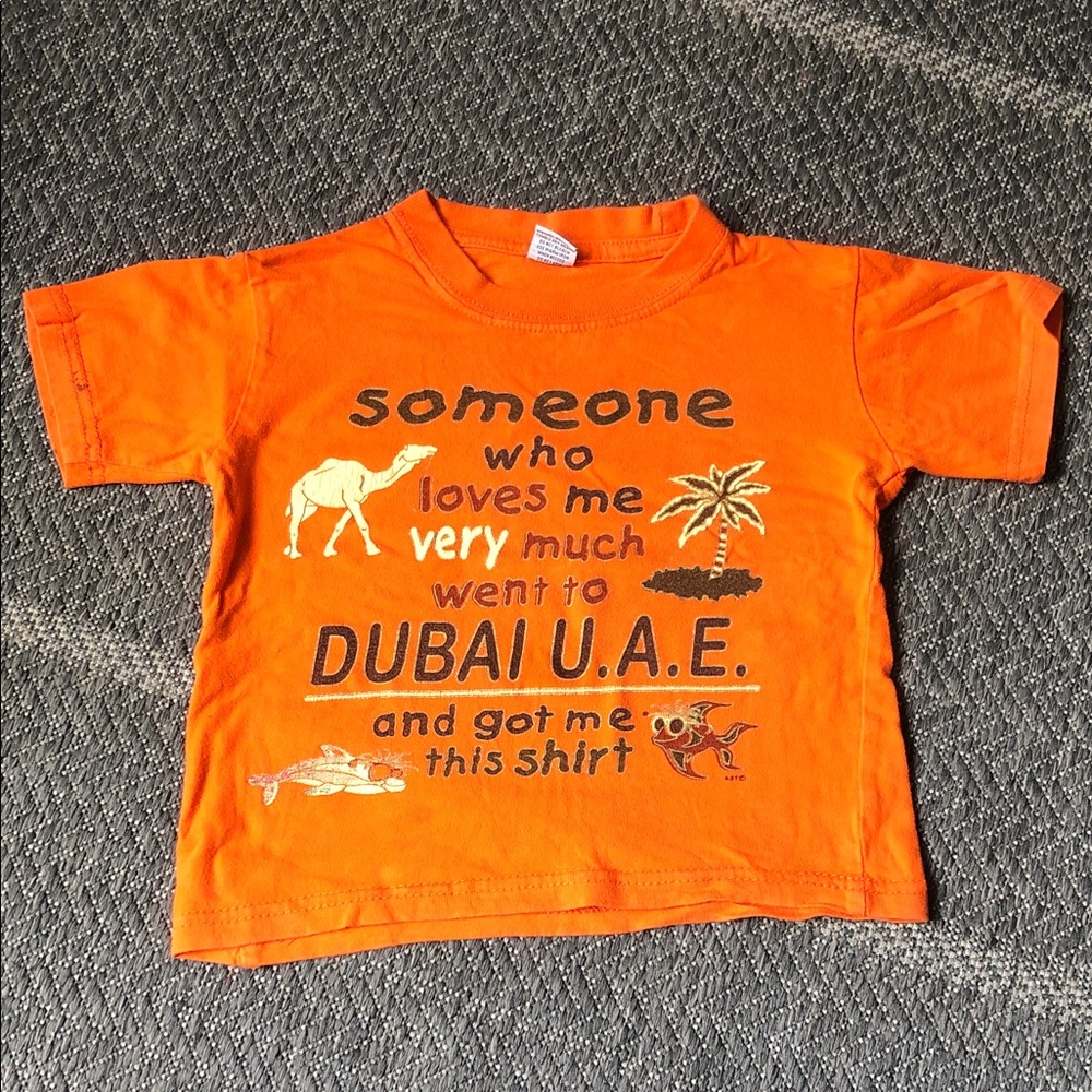 Orange Dubai U.A.E. Kids Tee with Camel Graphic